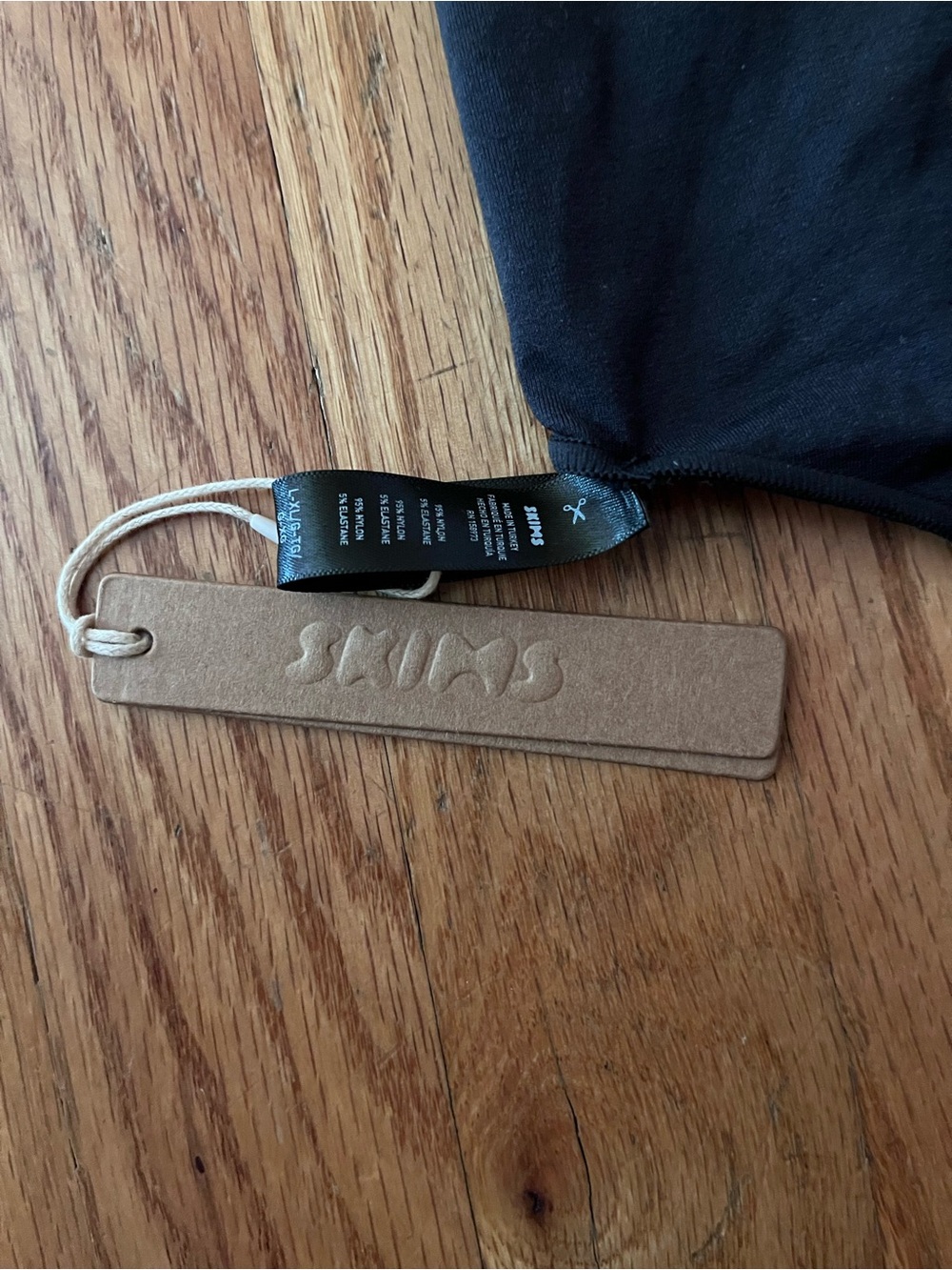 SKIMS Black Men's Hat with Branded Tag